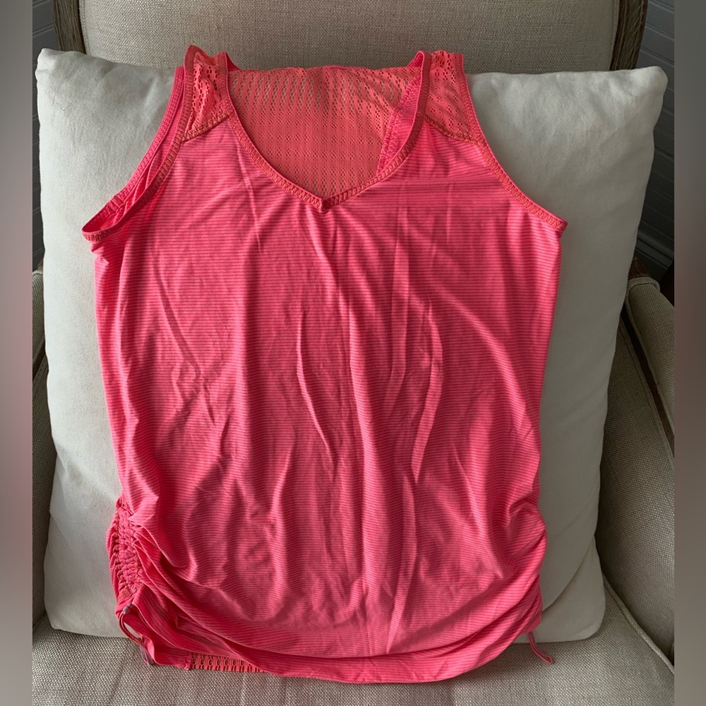Lululemon melin/pink mesh back tank.  Adjustable at the sides. Size 8